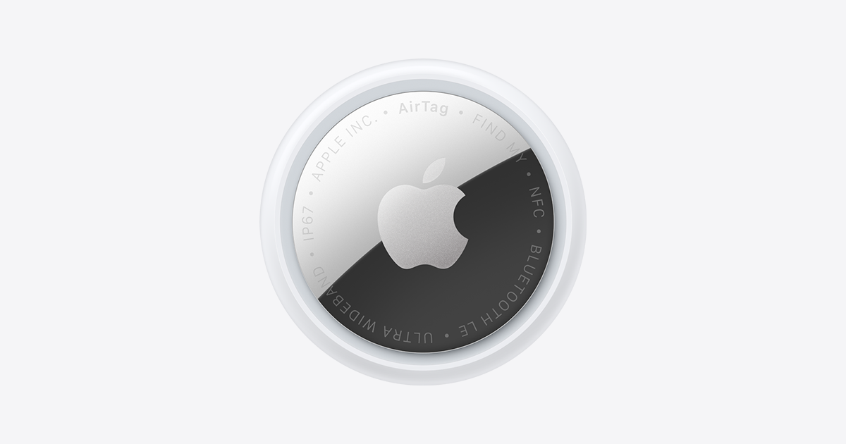 Apple AirTag visto de frente, disco branco com face prateada e o logotipo da Apple