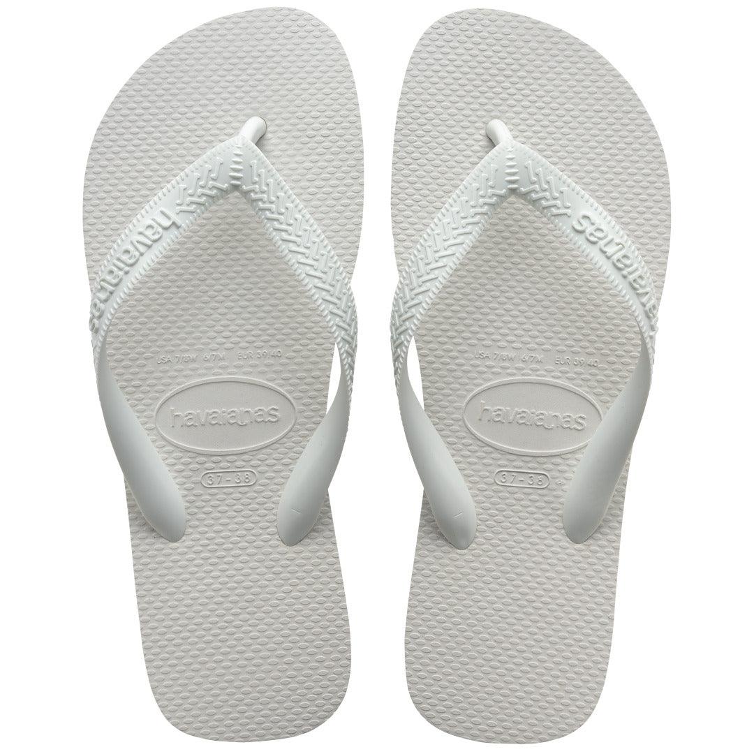 Par de chinelos Havaianas Top branco, visto de cima, com tiras de PVC texturizado