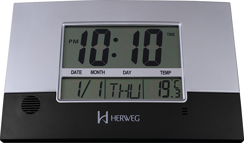 Relógio digital Herweg 6473 com visor mostrando hora em dígitos grandes, calendário e temperatura
