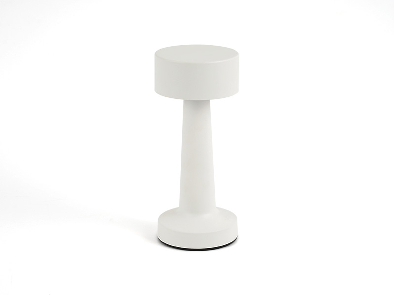 Luminária de mesa LED Taschibra Jimp branca, compacta, com base larga e cabeça cilíndrica